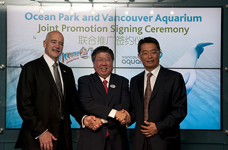 Mr. John Nightingale, President of Vancouver Aquarium, Mr. Paul Pei, Executive Director, Sales and Marketing of Ocean Park Hong Kong and Mr. James Ho, Board Director of Vancouver Aquarium pose for a photo at the official signing ceremony